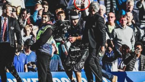 帮足球教练打人犯规吗